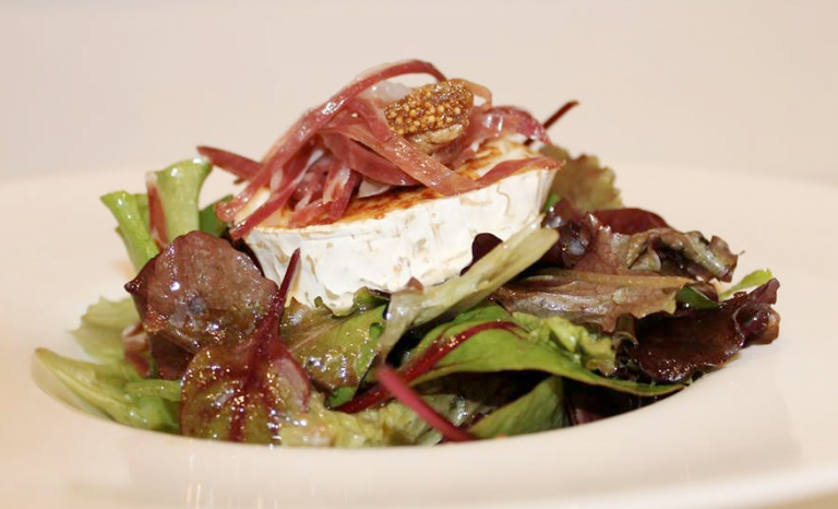 Caramelized goat cheese salad with Jamon Iberico de Bellota 