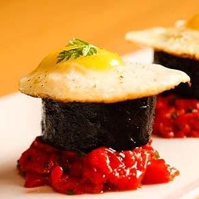 Morcilla Ibérica de Bellota with quail egg and Piquillo Peppers
