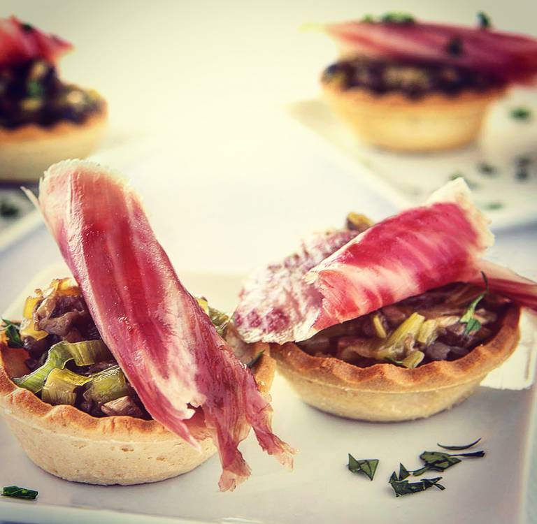 Tartlets with seasonal mushrooms and Ibérico Ham